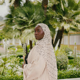 Versatile abaya crafted from breathable linen and finished with hidden pocket details.