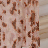 Modal hijab with a fierce camo-cheetah pattern, soft and stylish for bold outfits