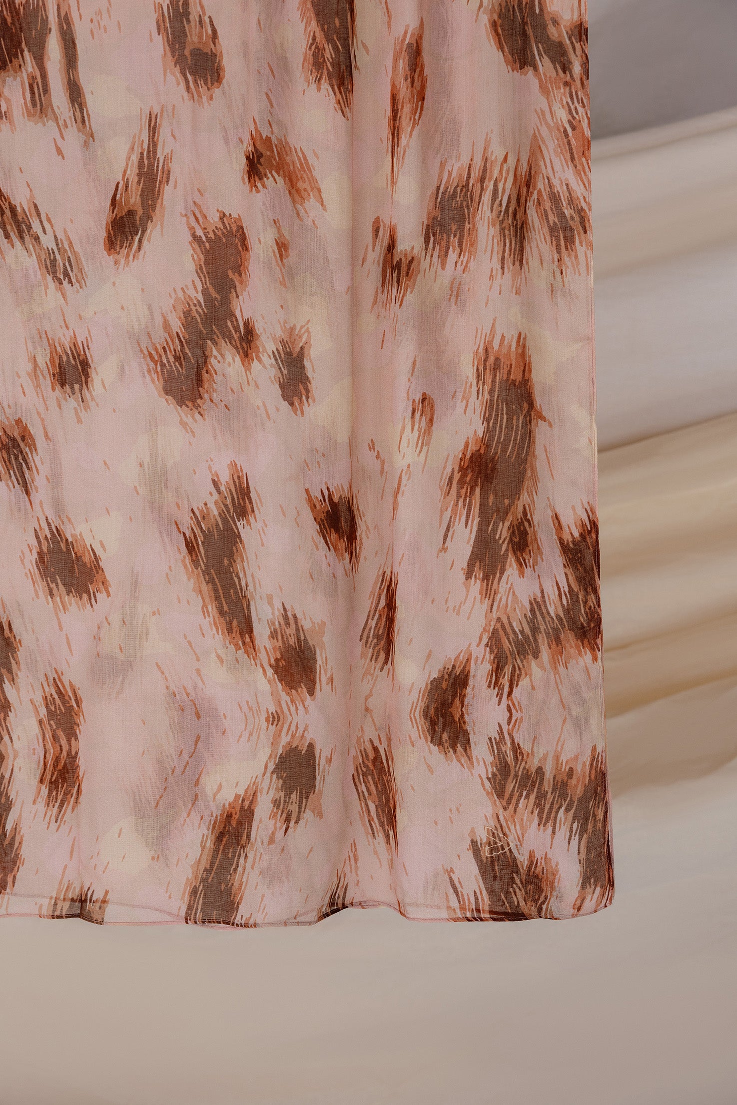 Modal hijab with a fierce camo-cheetah pattern, soft and stylish for bold outfits