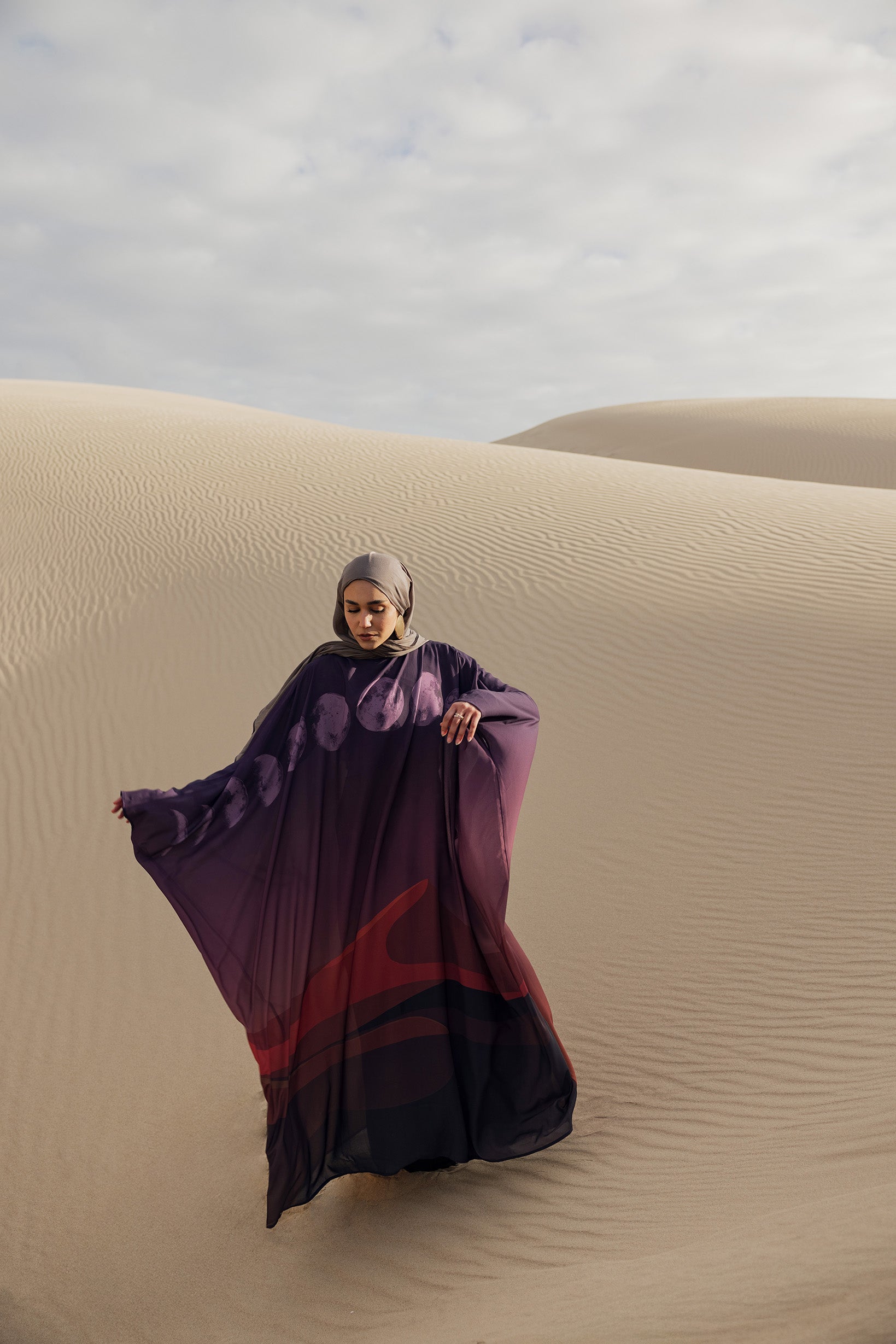 Celestial-themed abaya with lunar motifs, made to pair with an underdress for full coverage