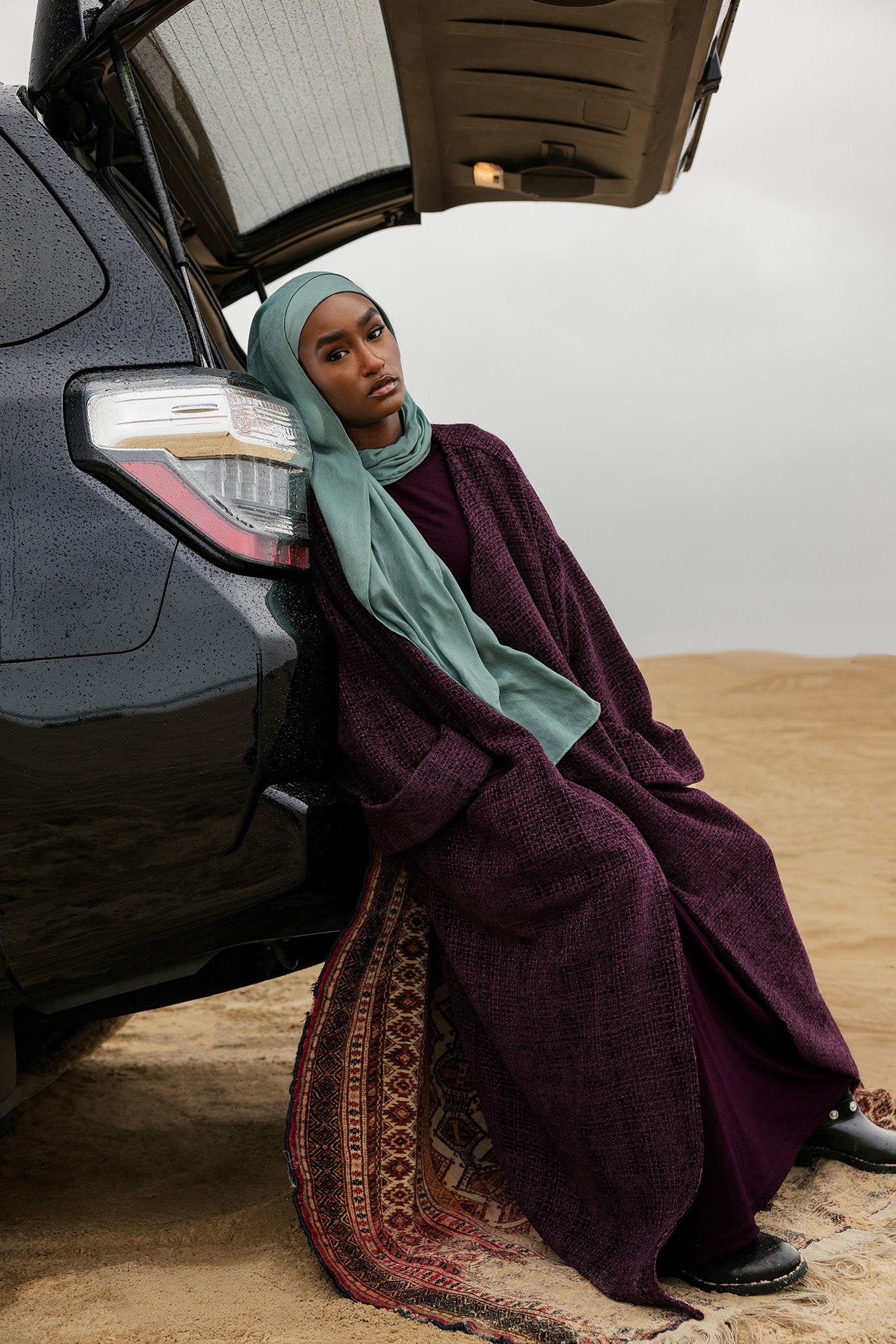 Textured tweed abaya with a generous fit and elevated everyday style