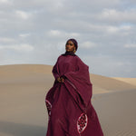 Modest draped kaftan with timeless elegance, perfect for celebrations or quiet evenings