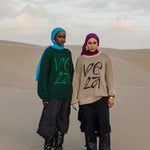 Comfortable oversized sweater with all-over pattern and minimal stitched branding
