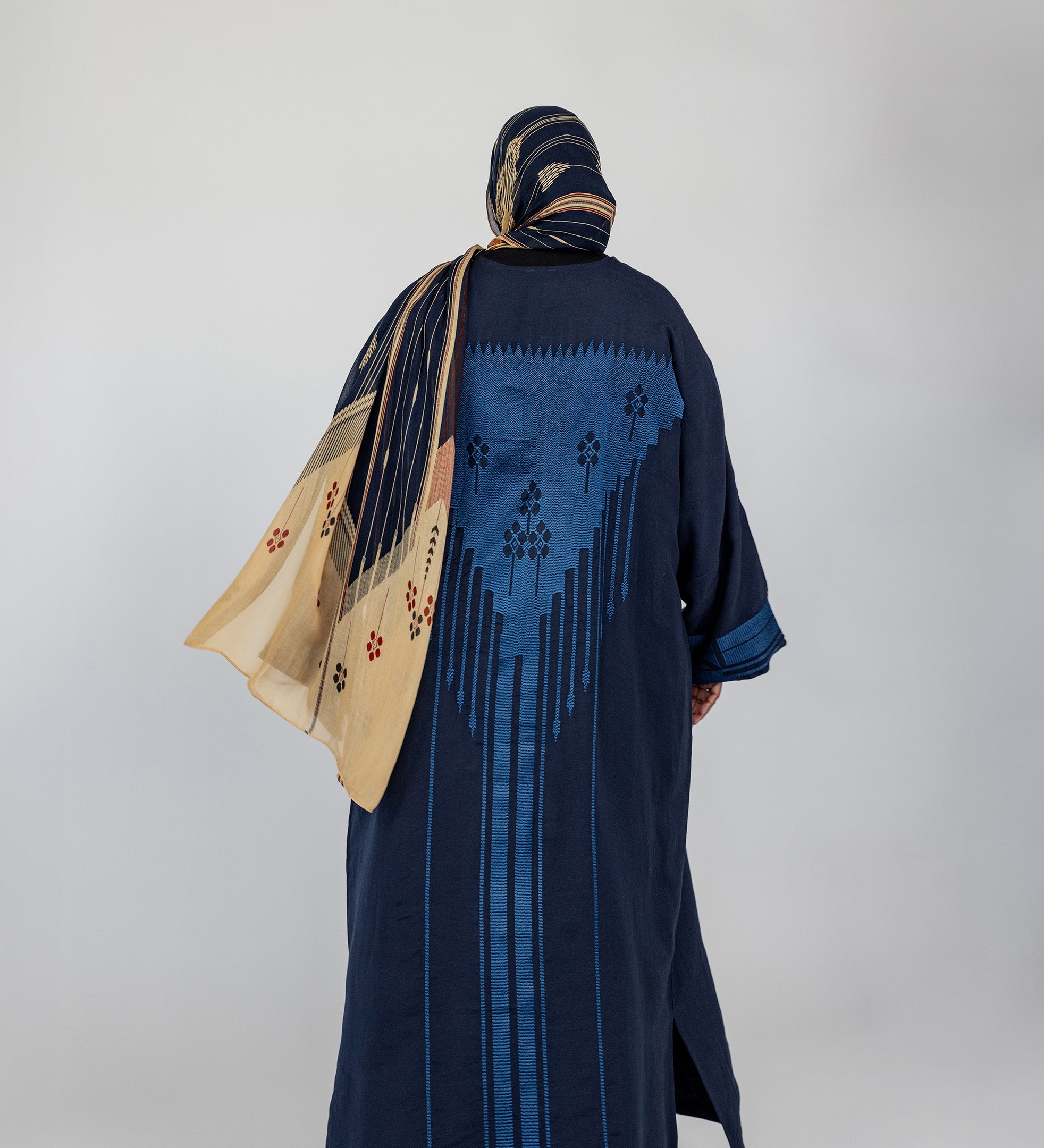 Full-length abaya with elegant embroidery across the back and smooth, breathable fabric