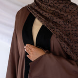 Modest abaya crafted from breathable fabric with two wearable sides for multiple looks
