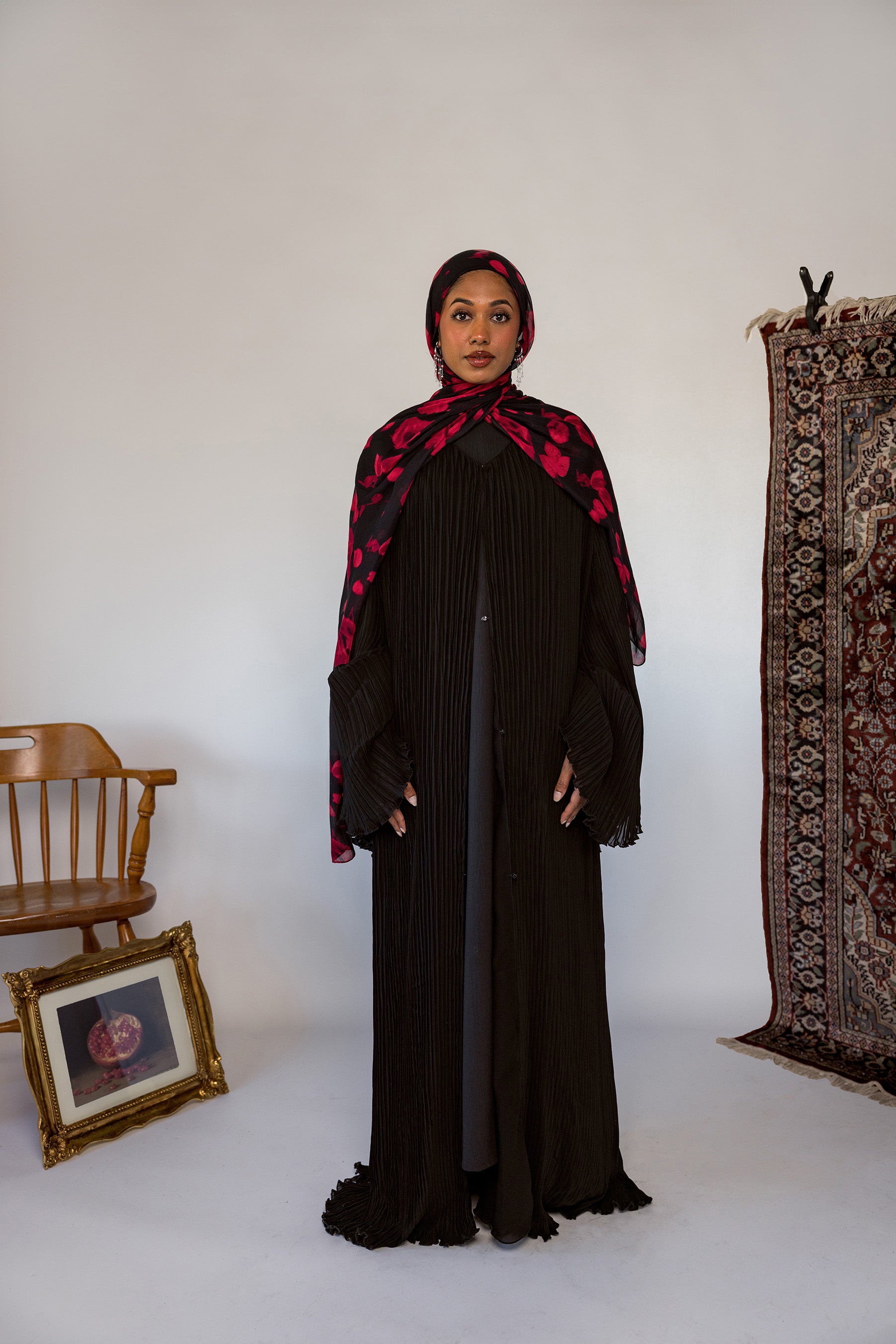 Pleated abaya designed with gentle fabric and full coverage for everyday wear or occasions.