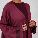 Abaya with thoughtfully placed back stitching and a gentle, flowing shape