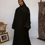 Full-length pleated abaya crafted from soft fabric with all-over flowing pleats.
