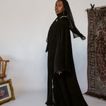 Modest pleated abaya with soft texture and movement that flows beautifully.