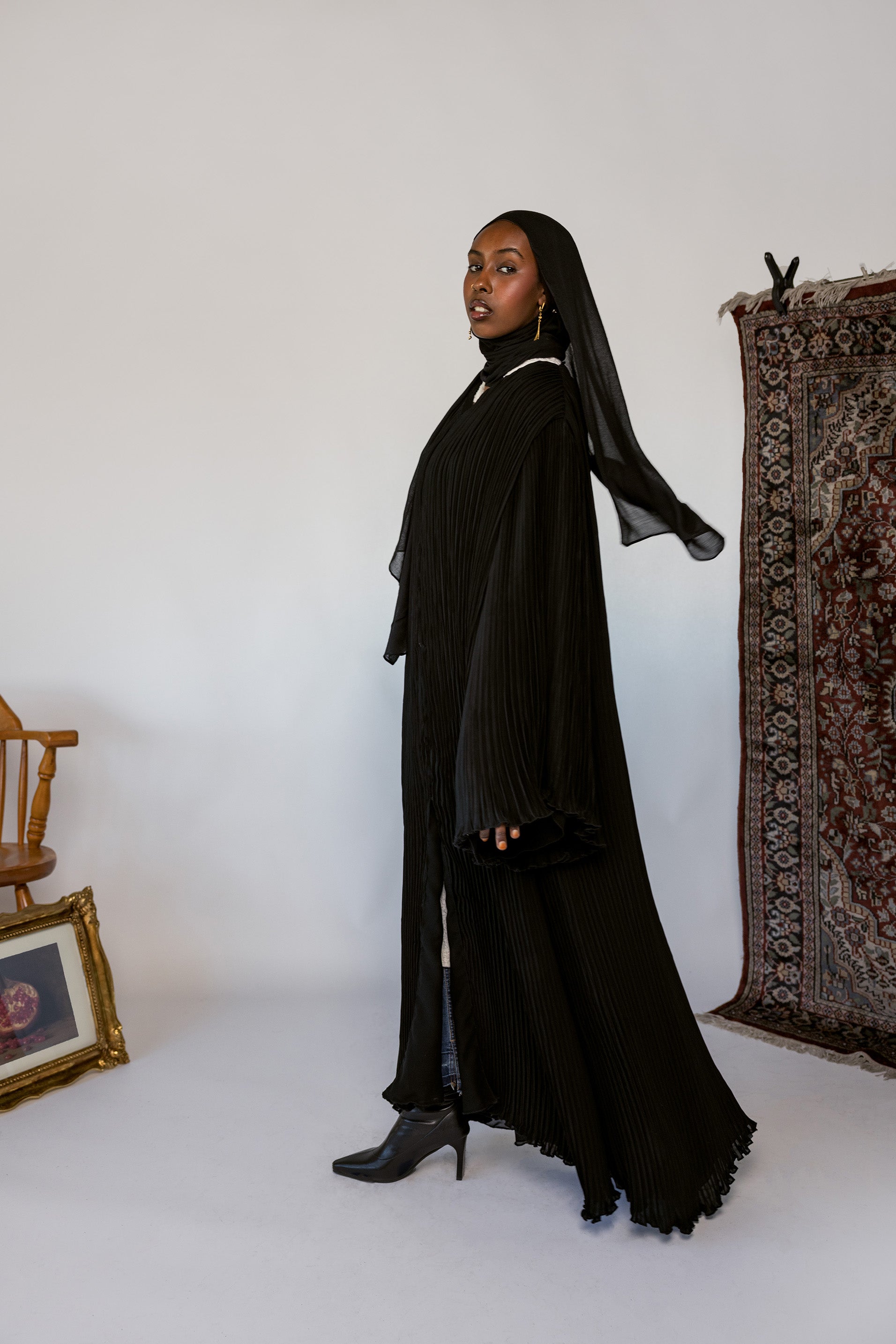 Modest pleated abaya with soft texture and movement that flows beautifully.