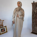 Lightweight abaya with a soft sheen and flowing drape for a radiant finish.