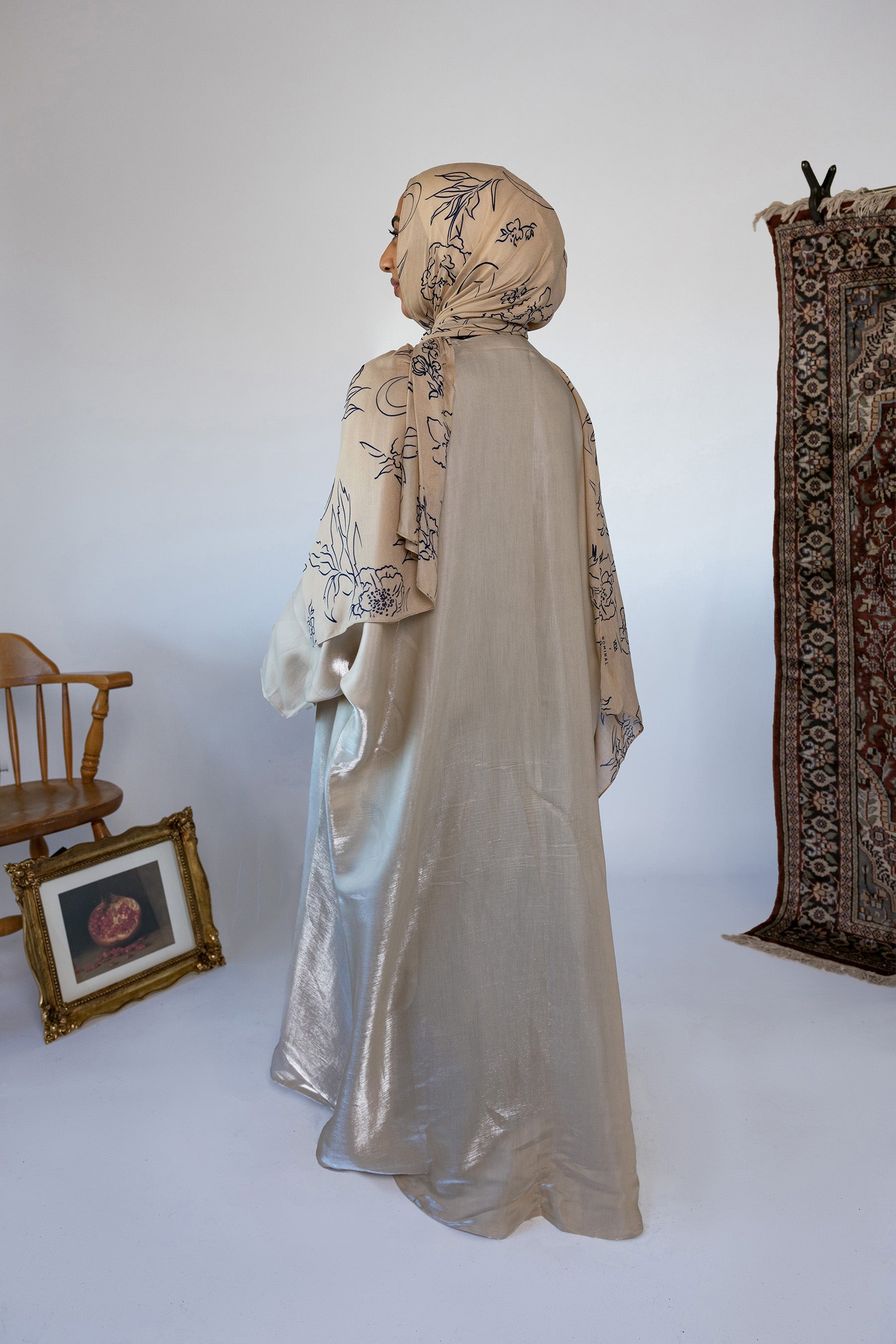 Occasion-ready abaya with subtle shine and lightweight coverage for Ramadan or beyond.