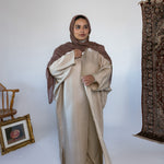 Soft and fluid abaya crafted for special occasions or styling on its own.