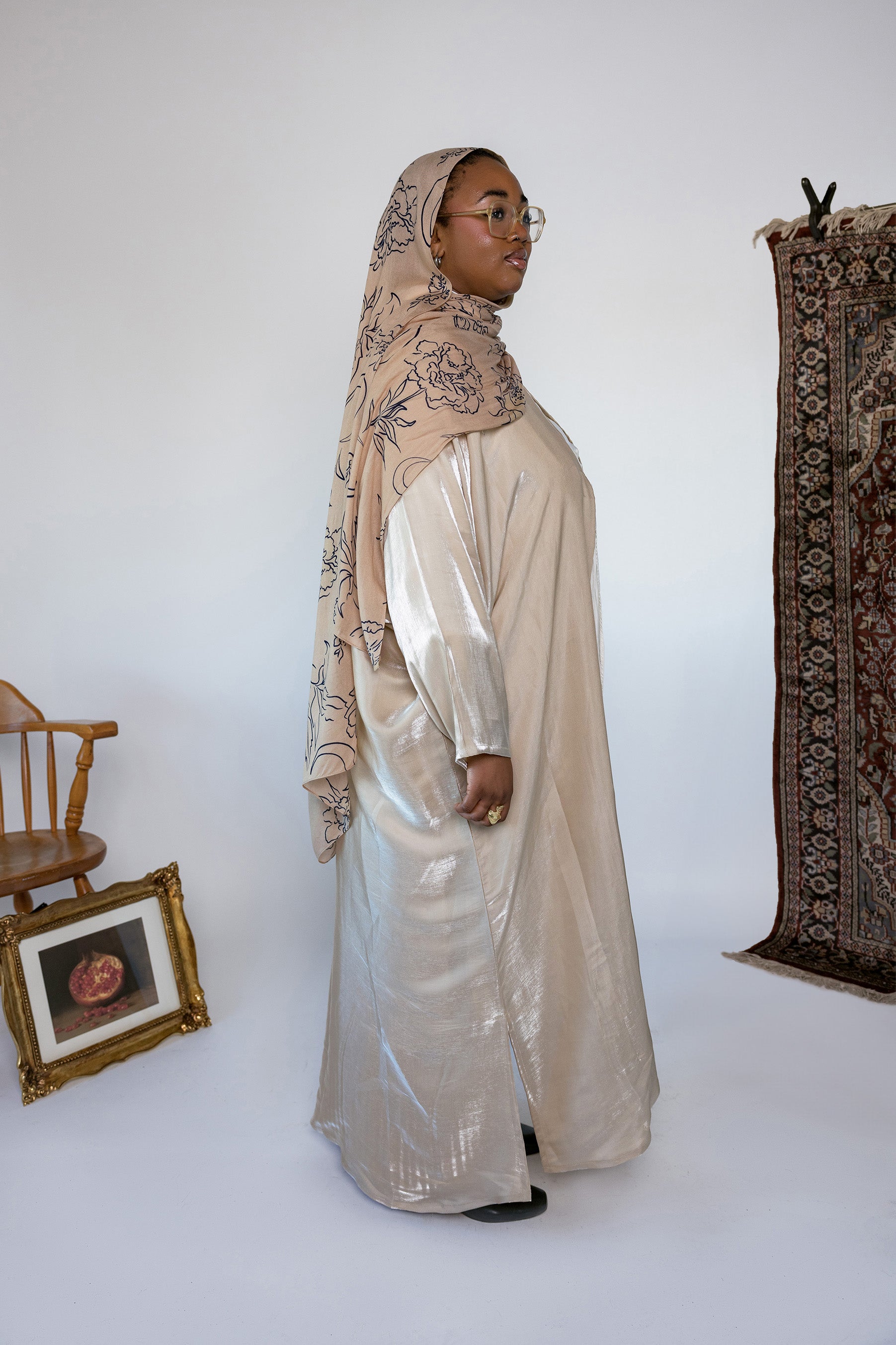 Glowing abaya with delicate texture and breathable fabric, perfect for evening wear.