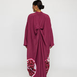 Occasion-ready kaftan with rich drape and subtle nods to traditional symbolism