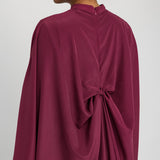 Draped formal kaftan designed to celebrate heritage through movement and style