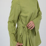 Minimal top in a soft, breezy fabric with a gentle tie detail at the front