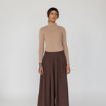 Palazzo-style pants with a relaxed fit and clean, minimal silhouette