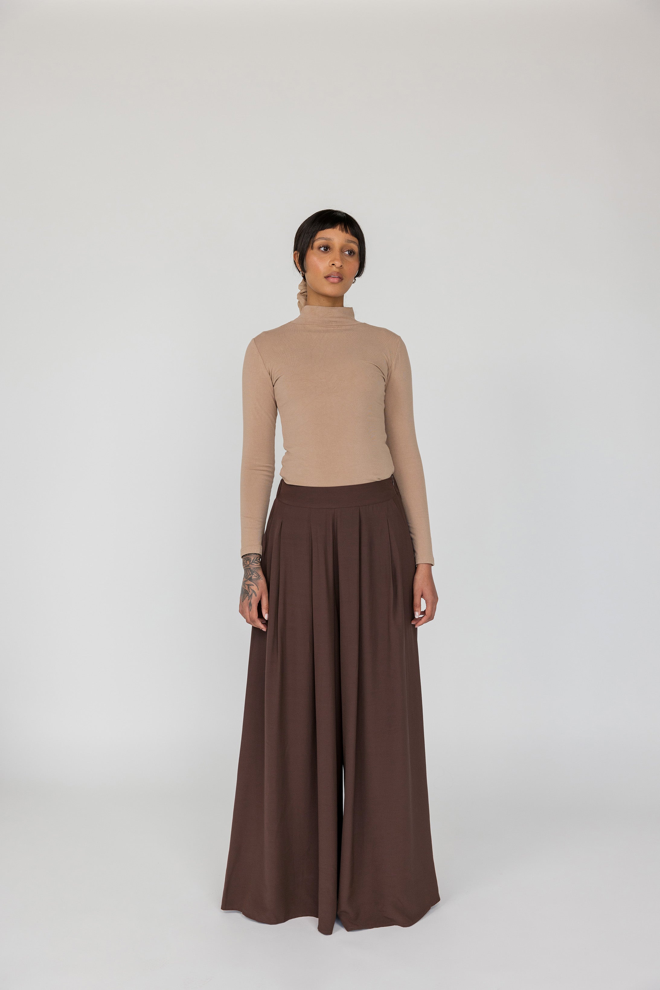 Palazzo-style pants with a relaxed fit and clean, minimal silhouette