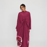 Statement kaftan with elegant draping and a heritage-inspired design for special occasions