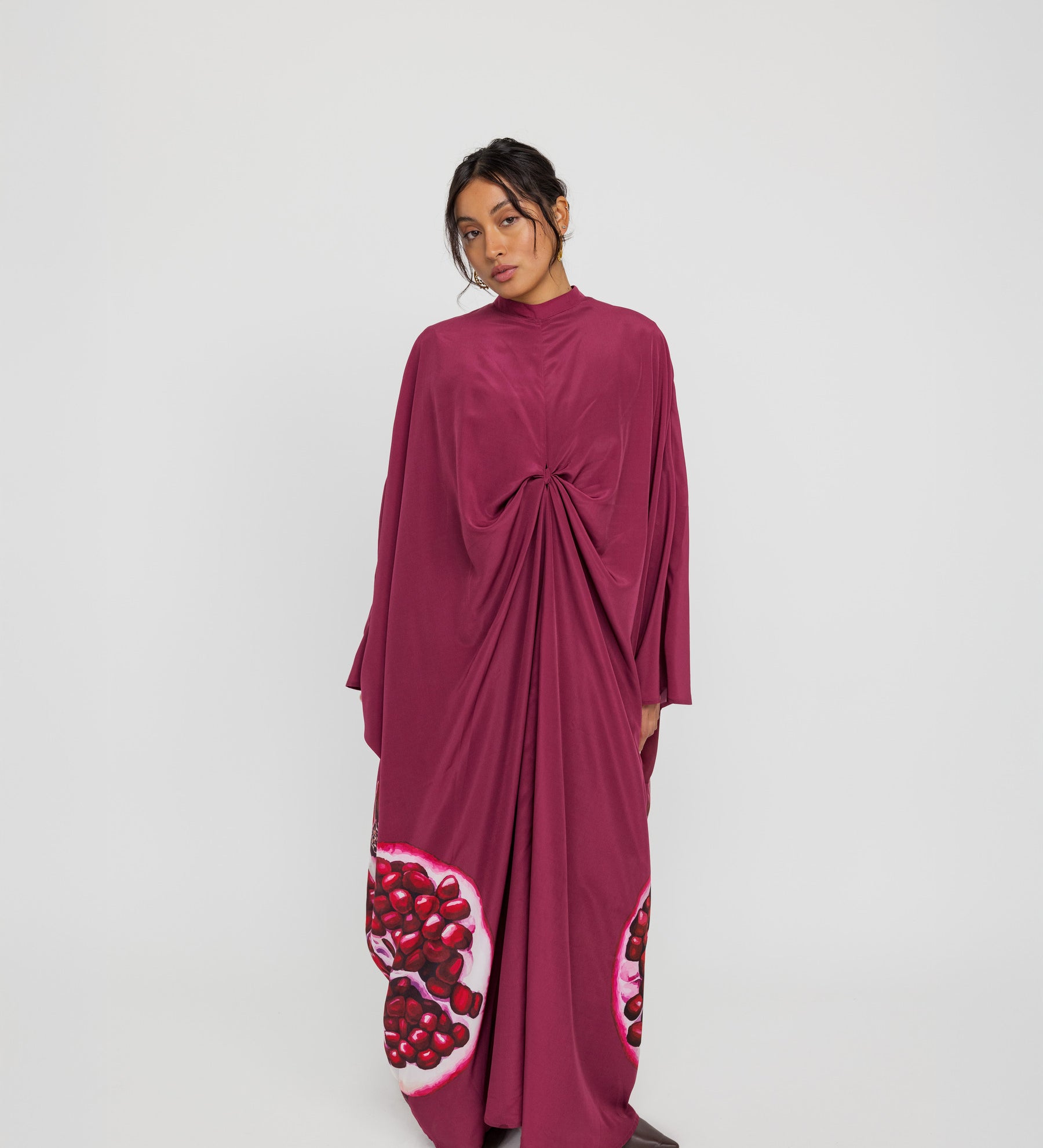 Statement kaftan with elegant draping and a heritage-inspired design for special occasions