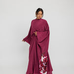 Modest kaftan with a fluid shape and soft structure, evoking timeless beauty and abundance