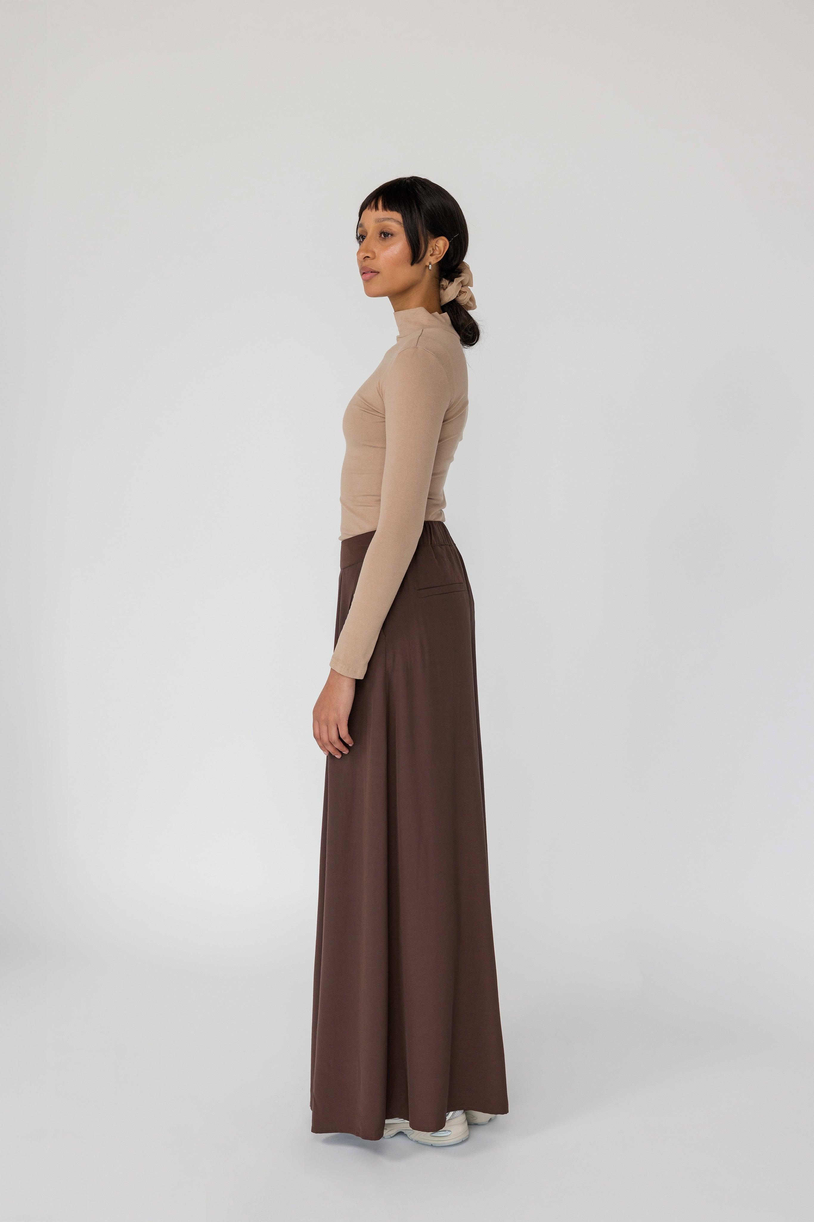 Softly tailored wide-leg pants perfect for pairing with long tops or modest layers