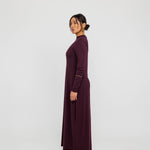 Base layer knit dress with a close fit, ideal for styling under sheer or open pieces.