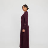 Base layer knit dress with a close fit, ideal for styling under sheer or open pieces.