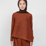 Modest pleated top with fluid lines and relaxed fit for everyday elegance