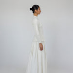 Modest skirt with full pleats and crisp cotton texture, designed to move with ease.