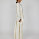 VELA cream skirt designed for modest wear with a soft flow and all-day comfort.