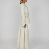VELA cream skirt designed for modest wear with a soft flow and all-day comfort.