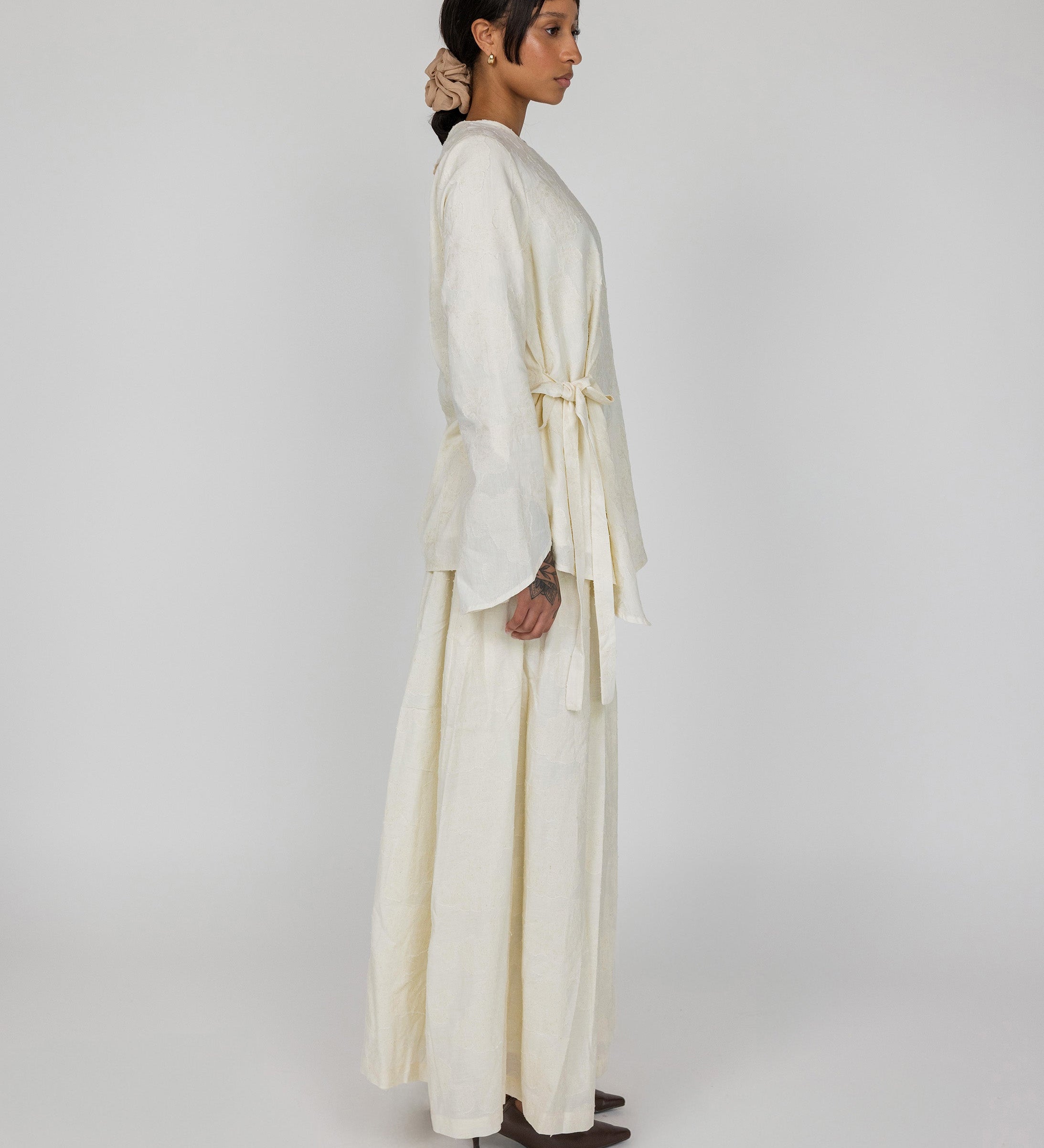 VELA cream skirt designed for modest wear with a soft flow and all-day comfort.