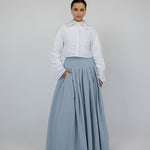 Pleated cotton skirt with a clean finish and full silhouette, made for comfort and flow