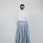 Full-coverage cotton skirt designed with intentional movement and a tailored fit