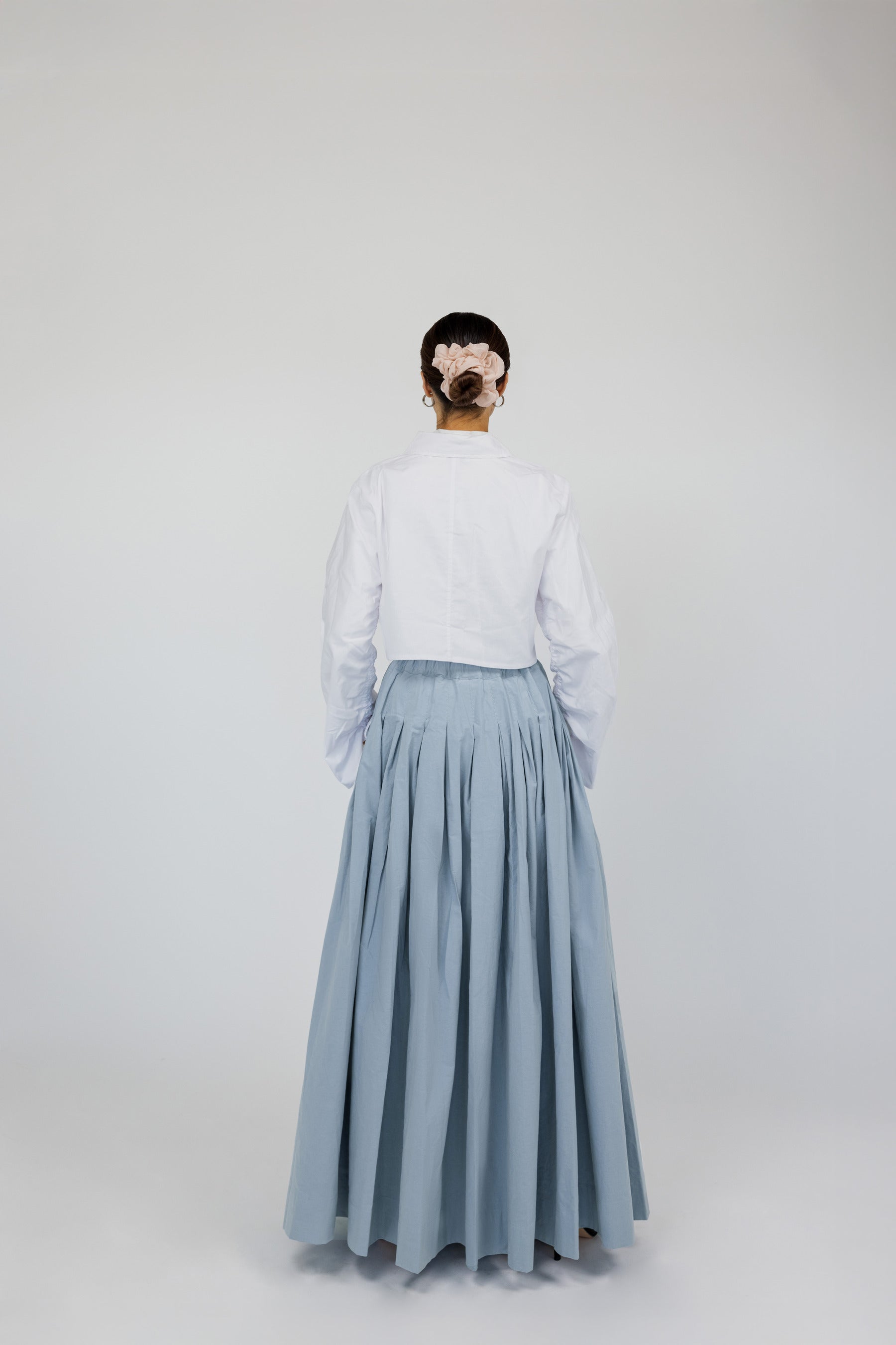 Full-coverage cotton skirt designed with intentional movement and a tailored fit