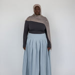 Structured cotton skirt with full pleats that move naturally and hold their shape.