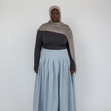 Structured cotton skirt with full pleats that move naturally and hold their shape.