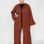 Modest pleated pants with an easy fit and timeless, elevated design