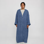Textured abaya with an oversized cut and soft tailoring for elevated layering