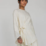 VELA textured cream top featuring a front tie and light, flowy fabric