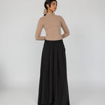 Full-coverage pants with wide legs and a polished, effortless look