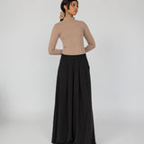 Full-coverage pants with wide legs and a polished, effortless look