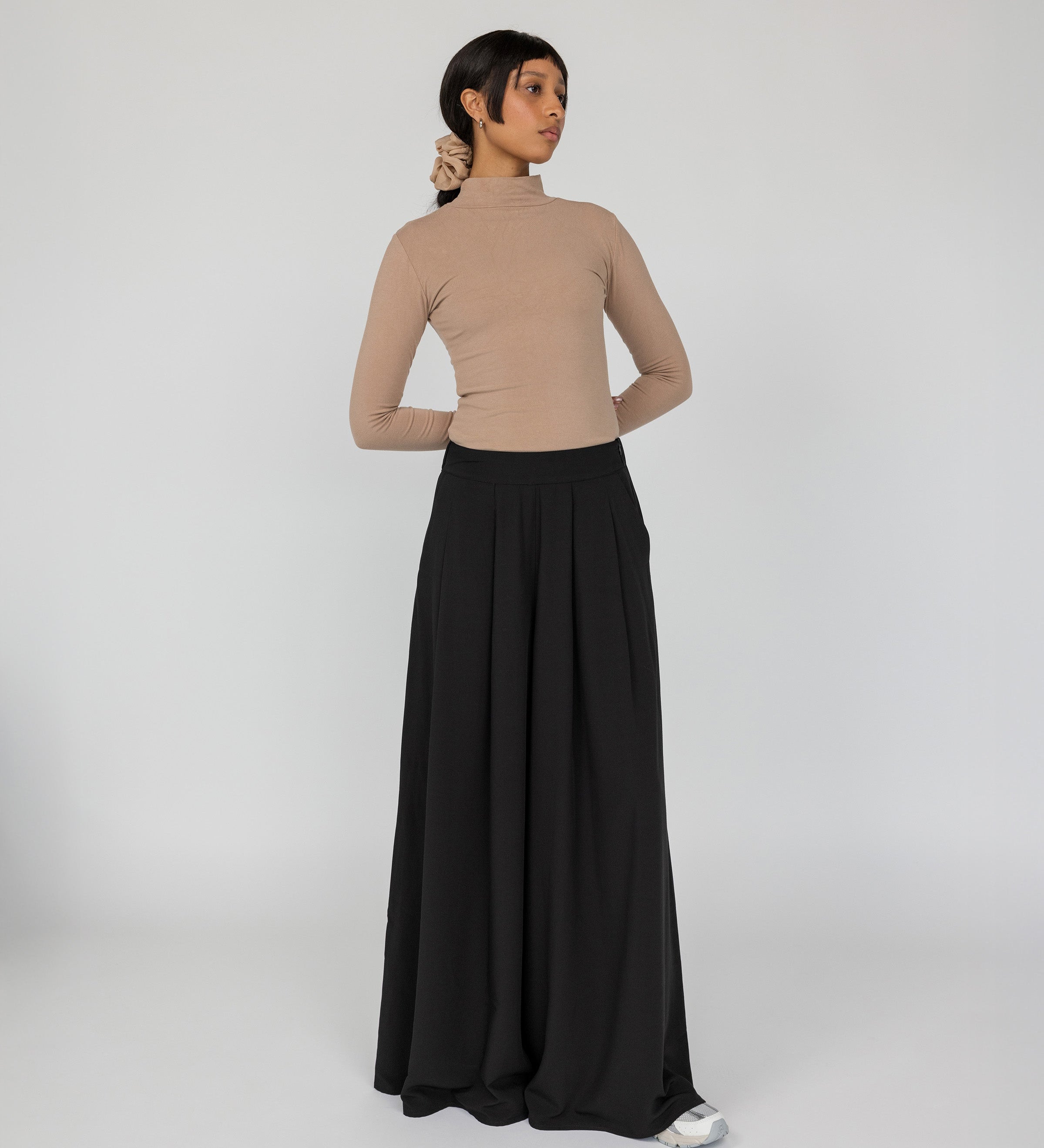 Full-coverage pants with wide legs and a polished, effortless look