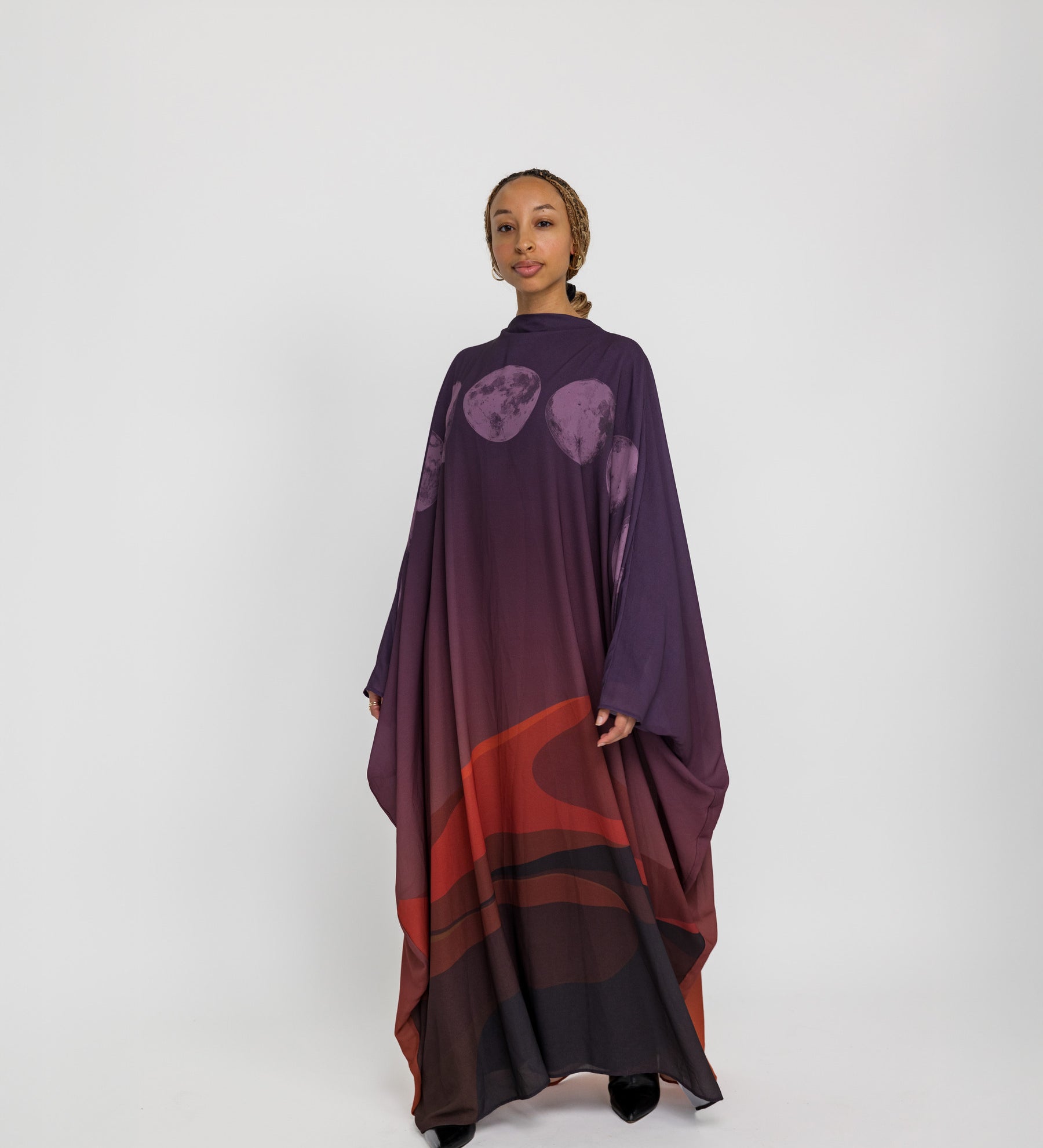 Lightweight abaya with celestial embroidery and a flowing, layered design