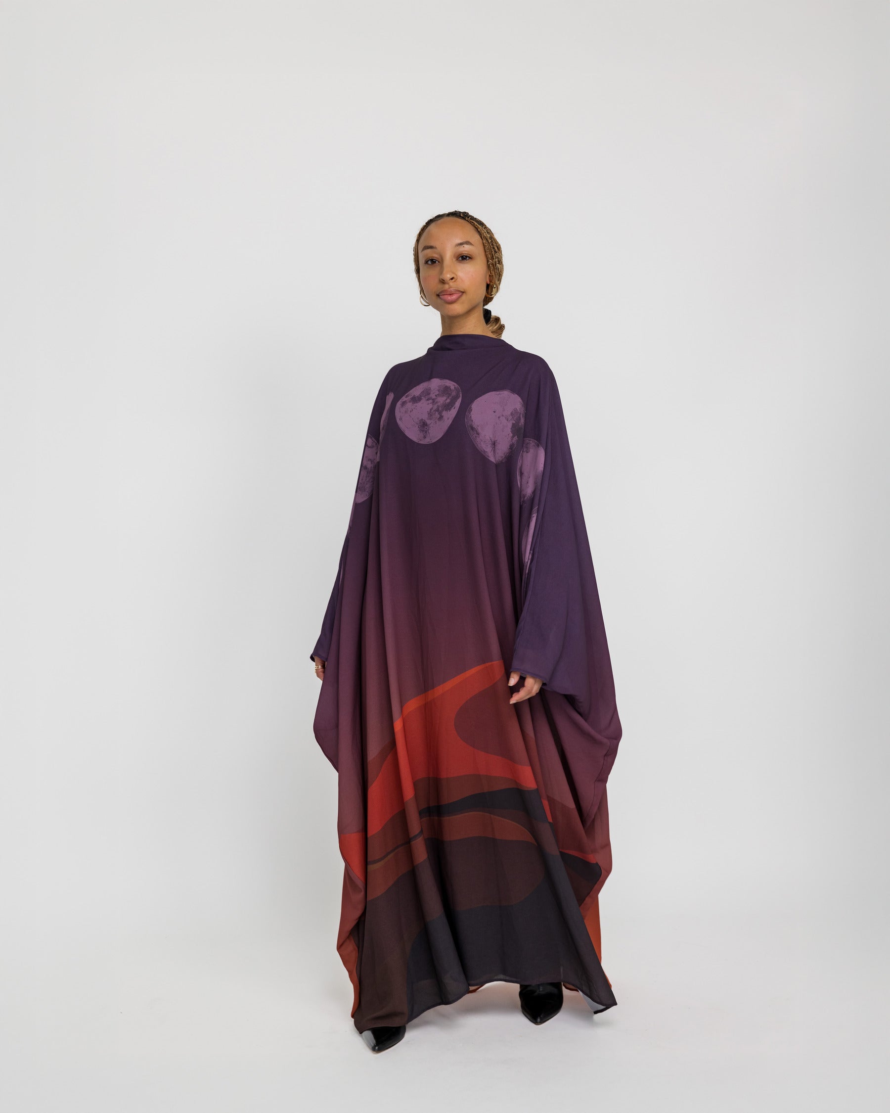Lightweight abaya with celestial embroidery and a flowing, layered design