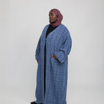 Relaxed-fit tweed abaya with a premium texture and soft, flowy shape