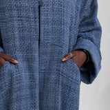 Full-coverage abaya in heavyweight tweed, designed to add dimension to your wardrobe