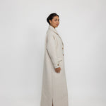 Abaya coat with classic trench design, featuring wide lapels and clean tailoring